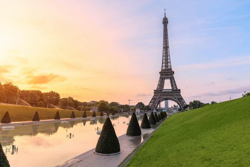 A scenic shot of the Eiffel Tower in Paris at golden hour.